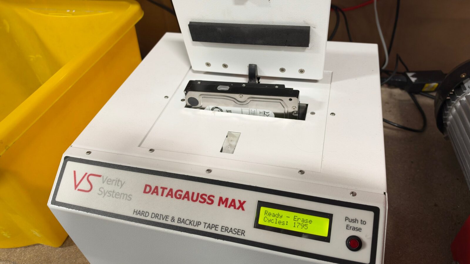A hard drive loaded into the Verity Systems Datagauss Max degausser at the Revolve ITAD facility